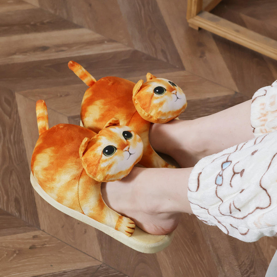 Plush cat slippers close-up showing soft cushioned interior